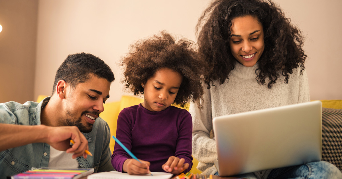 Portrait of an african american family doing daily activities at home