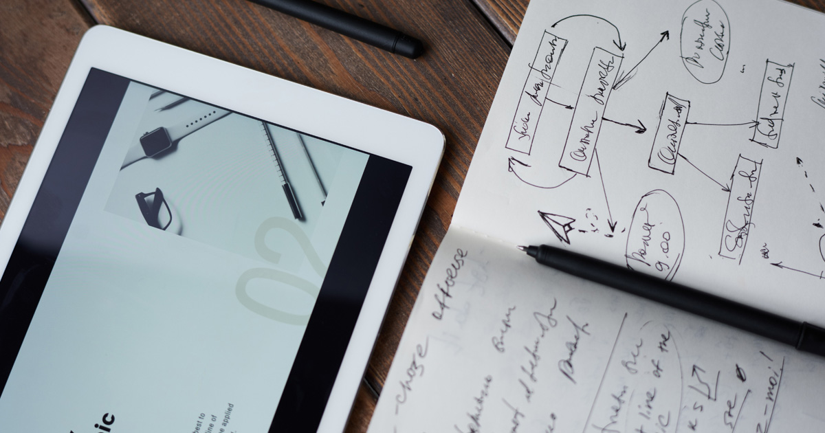Photo of pen on top of notebook