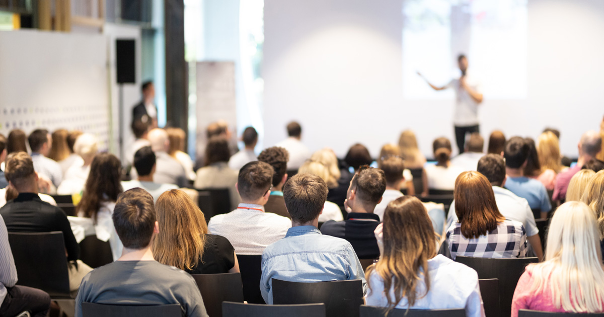Speaker giving a talk in conference hall at business event