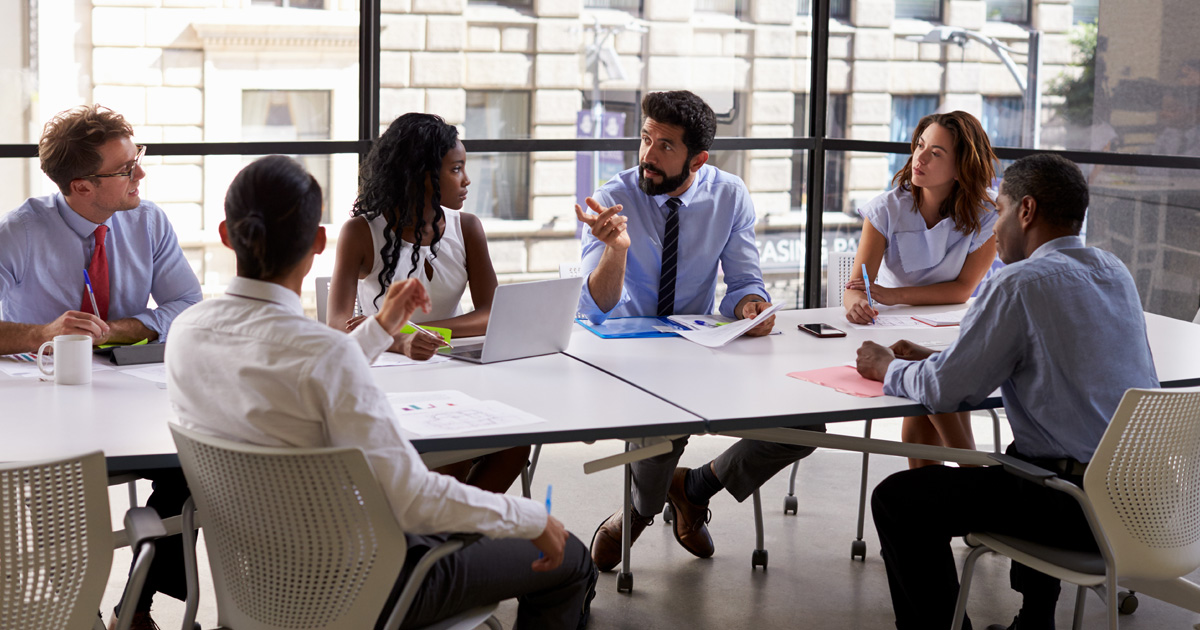 Corporate business team and manager in a meeting
