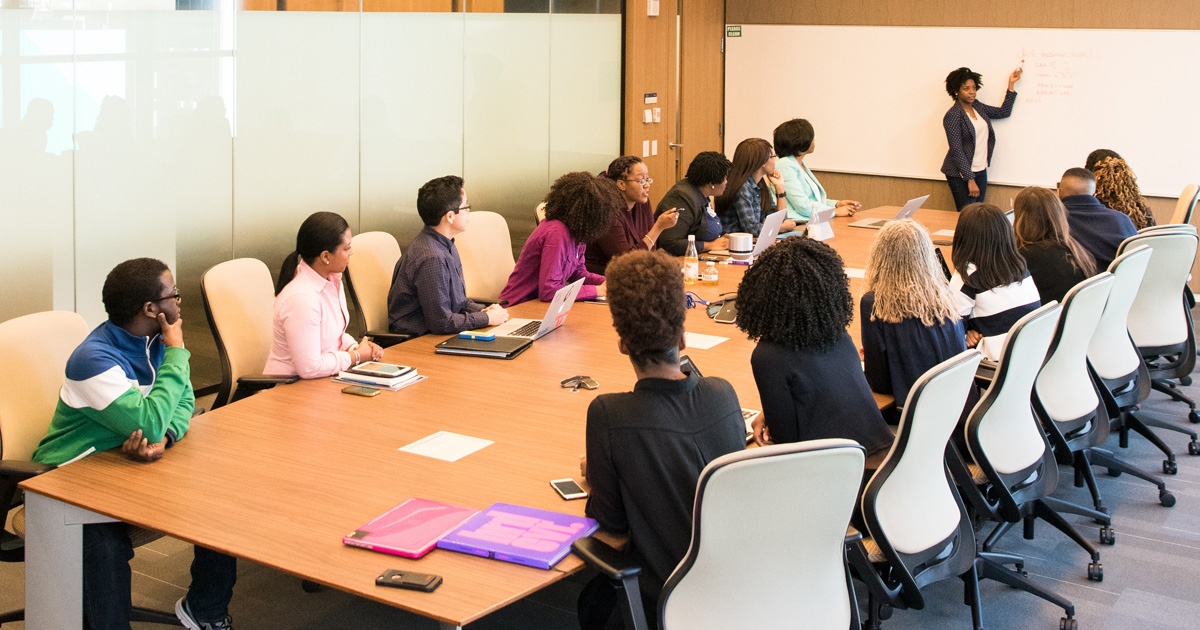 People having meeting inside conference room