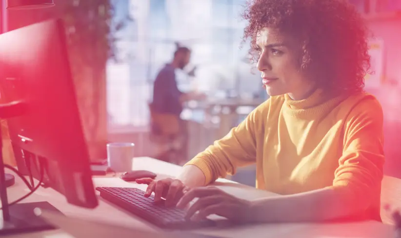 Person sitting at computer in an office